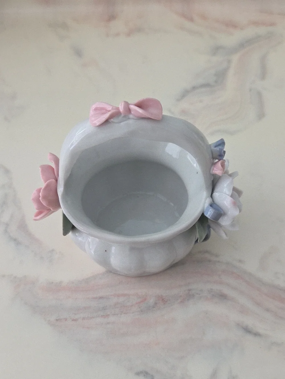 Delicate White Ceramic Flower Basket with Pink Accents